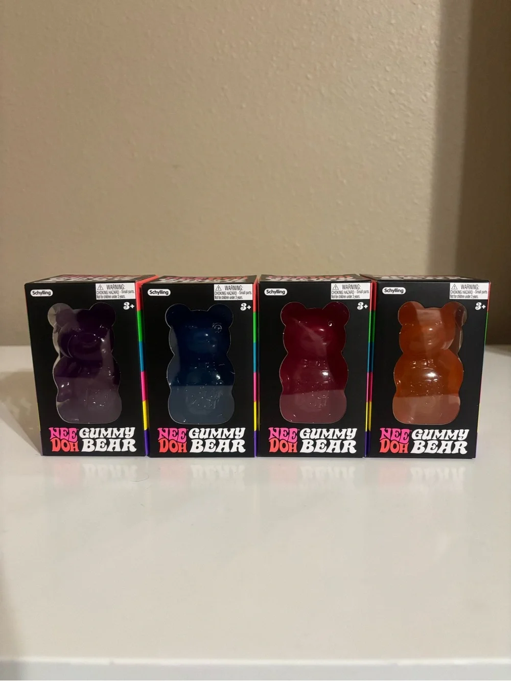 (4) NeeDoh Gummy Bears- Purple, Blue, Red, Orange